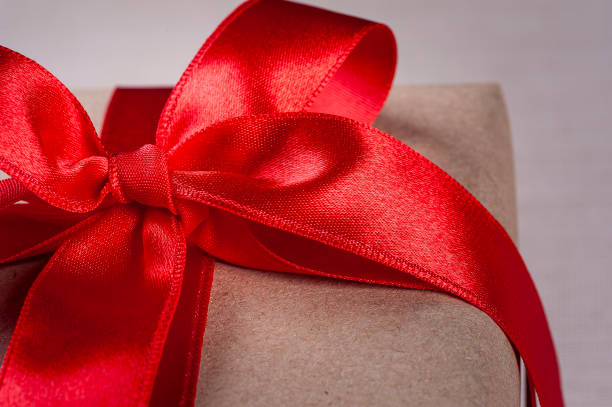 istock Valentine's gift with red ribbon 1297463582