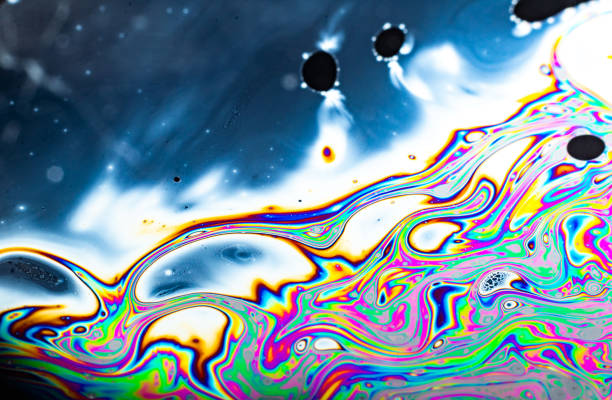 Background of abstract drawings of many colors in water with soap and bubbles Background of abstract drawings of many colors in water with soap and bubbles water thinking bubble drop stock pictures, royalty-free photos & images