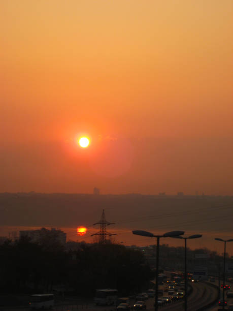 istock Sunset from the bridge, lake and traffic 1 1297467387