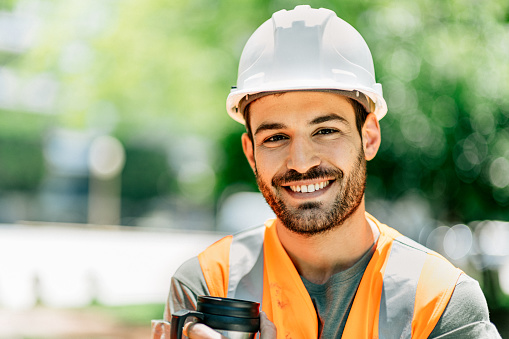 Construction worker portrait wearing a hard hat