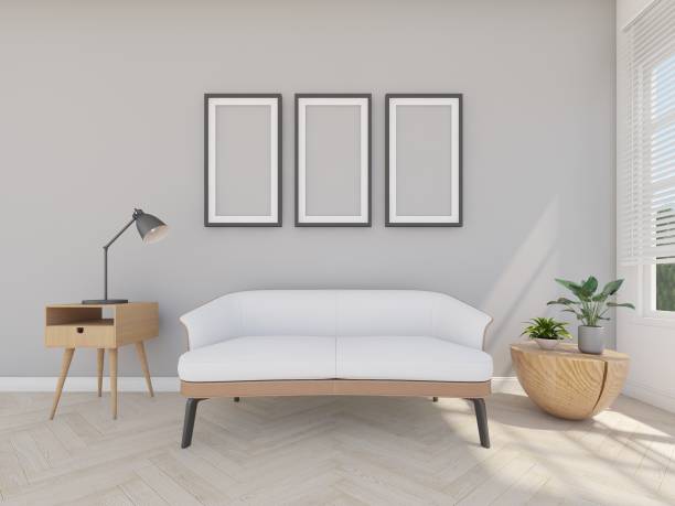 istock sofa in grey room with picture frame and reading lamp, 3d rendering 1297467608