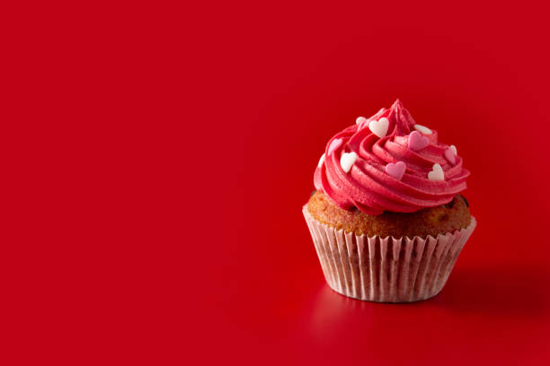 istock Cupcake decorated with sugar hearts for Valentine's Day 1297467730