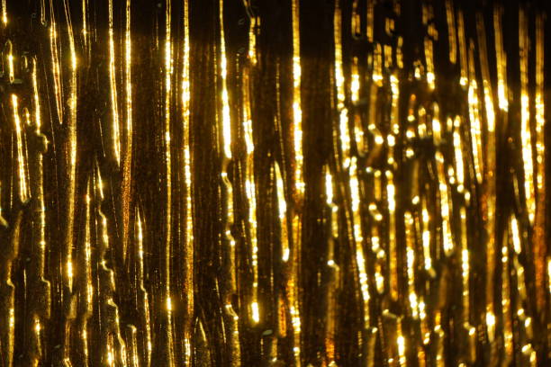 istock background yellow lights and icicles 1297472458