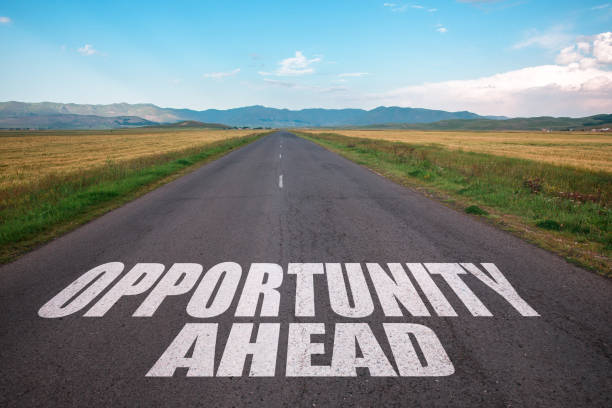 istock Opportunity ahead text on the road 1297472579