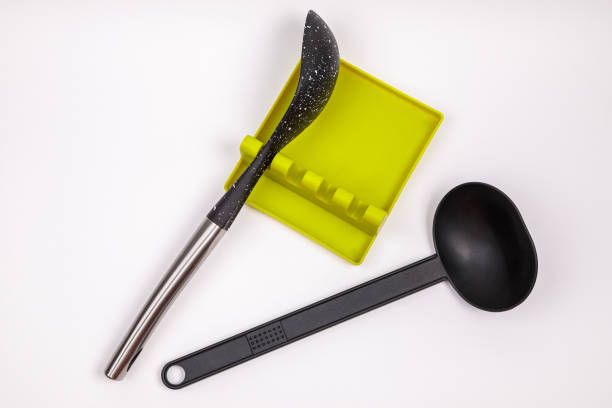 Stand, tray for large spoons, ladles, stirrers. Modern fittings in the kitchen. Convenient to prepare food.