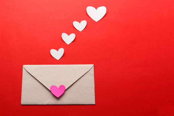 istock valentines love letters and messages with hearts on red background 1297476977