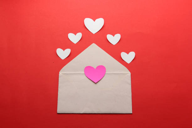 istock valentines love letters and messages with hearts on red background 1297477039