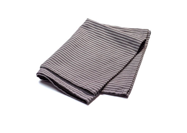 istock Gray linen napkin isolated on white background. 1297477982