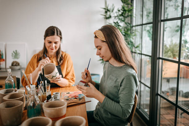 istock Painting my vision on the pottery 1297478358