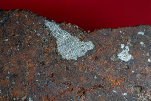 istock Inside slice of Chondrite Meteorite L Type isolated, piece of rock formed in outer space in the early stages of Solar System as asteroids. This meteorite comes from an asteroid fall at Atacama Desert 1297490600