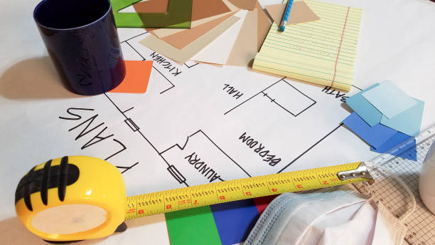istock Plans for Home Improvement on working desk. 1297490716