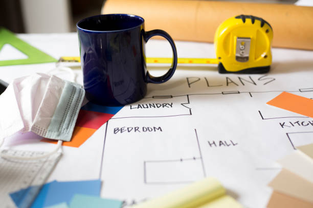 istock Plans for Home Improvement on working desk. 1297491325