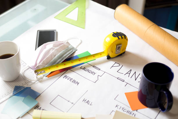 istock Plans for Home Improvement on working desk. 1297491363