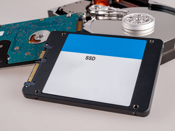 istock different types of computer drives, hard disk drives and SSD drives of different generations, data transfer, read and write 1297491623