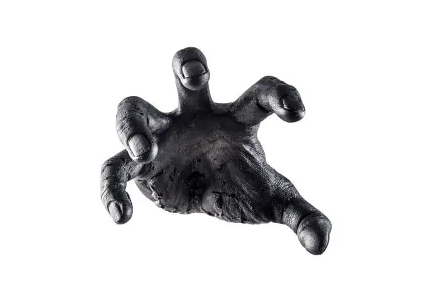 Photo of Creepy zombie hand isolated on white background with clipping path