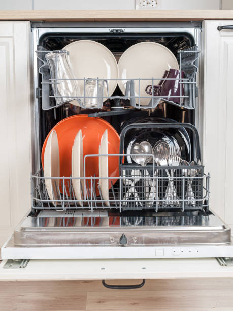 istock dishwasher close-up with washed dishes, easy to use and save water, eco-friendly, built-in kitchen dish washing machine 1297491806