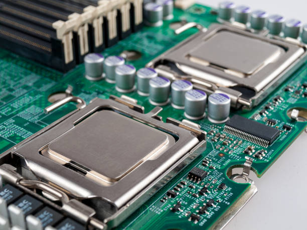 istock CPU connector on the circuit motherboard with pressure contacts for connecting a silicon microprocessor, CPU selection during computer assembly 1297492786