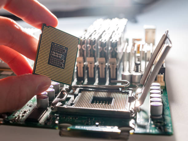 istock the process of connecting the CPU to the processor socket on a modern computer motherboard, replacing the silicon data processing chip, and correctly installing the central processing unit 1297493755