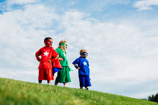 スーパーヒーローの子供たち - partnership creativity superhero child ストックフォトと画像