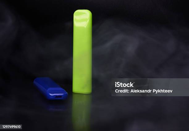 Disposable Electronic Cigarette Hqd On A Black Background Stock Photo - Download Image Now