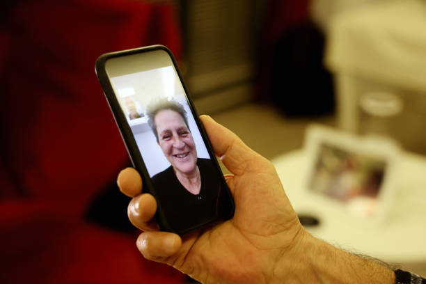 istock Senior couple video call with smart phone 1297501311