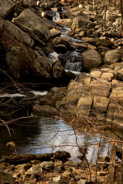 istock Mountain stream fast water, mountain rocks 1297501614