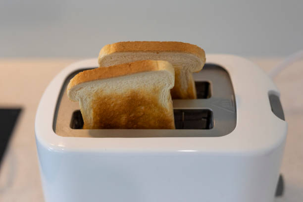 istock Toast in a Kitchen Toaster 1297506935