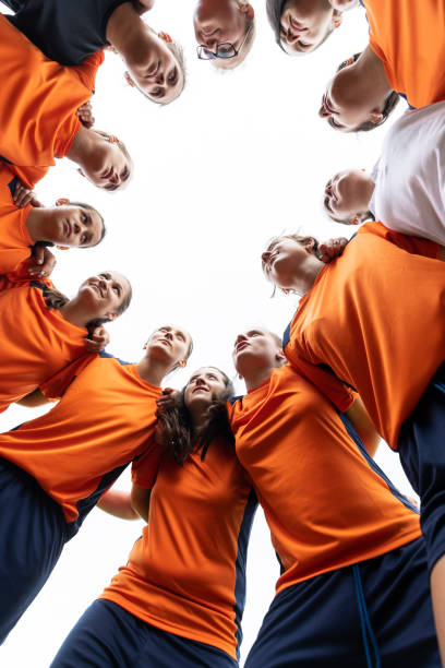istock Low angle view of female soccer team 1297508516