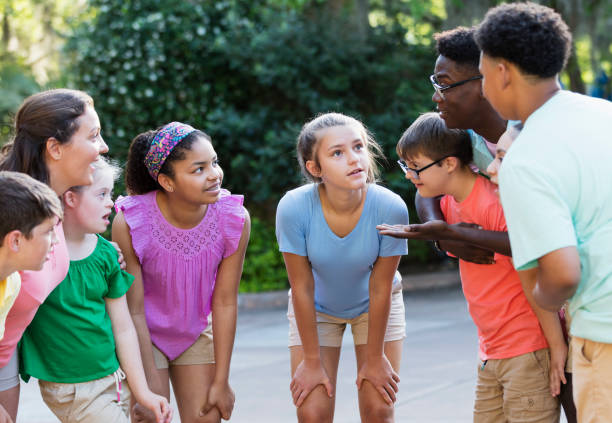 istock Summer camp including two down syndrome children 1297509101