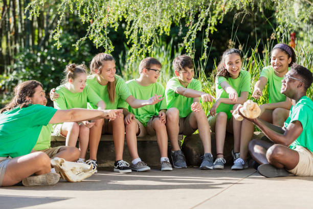 istock Summer camp including two down syndrome children 1297509127