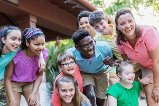 istock Summer camp including two down syndrome children 1297509157