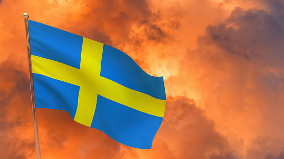 Sweden flag on pole. Dramatic background. National flag of Sweden