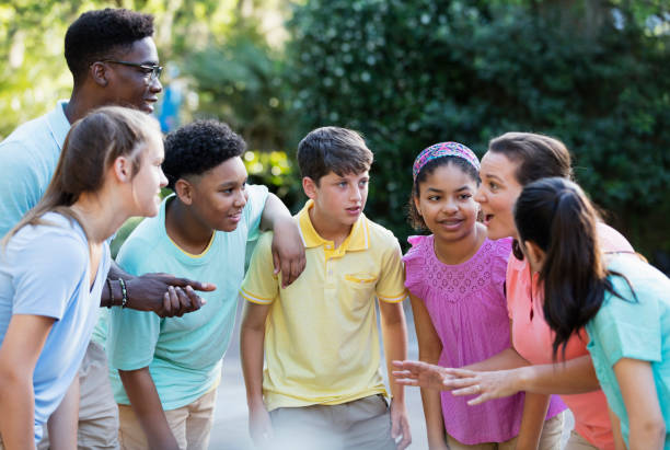 istock Multi-ethnic group of children on field trip 1297509195