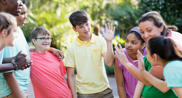 istock Summer camp including two down syndrome children 1297509214