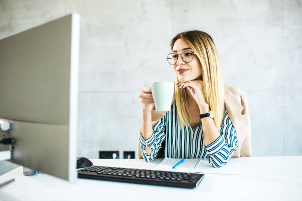istock Beautiful female working from home 1297509316