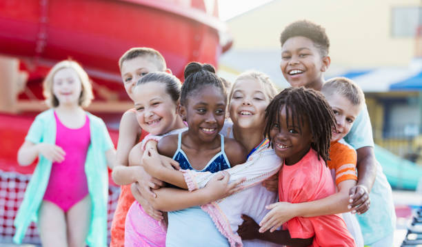 istock Group of friends having fun at water park 1297509702