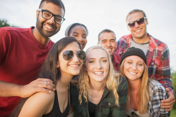 istock Multi ethnic group of young adults outdoors 1297513308