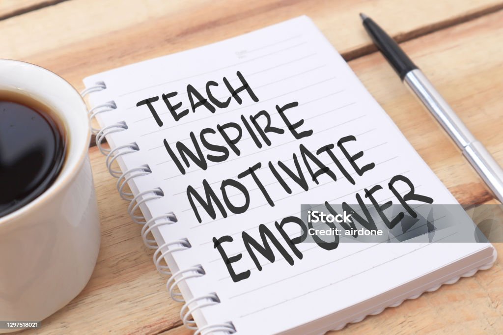 Teach inspire motivate empower, text words typography written on paper against wooden background, life and business motivational inspirational Teach inspire motivate empower, text words typography written on paper against wooden background, life and business motivational inspirational concept Teaching Stock Photo