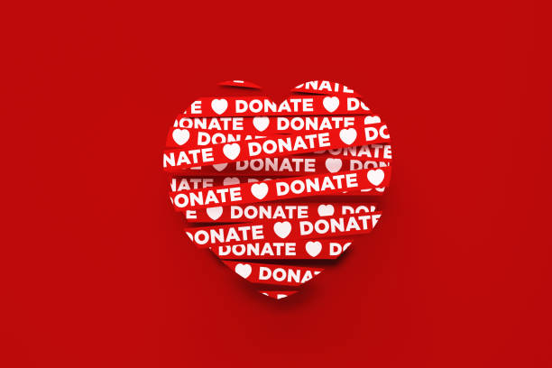 istock Donate Written Red Ribbon over Red Background 1297518237