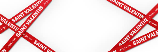 istock Happy Valentine's Day ( Joyeuse San Valentin in French ) Written Red and White Ribbons over White Background 1297519787