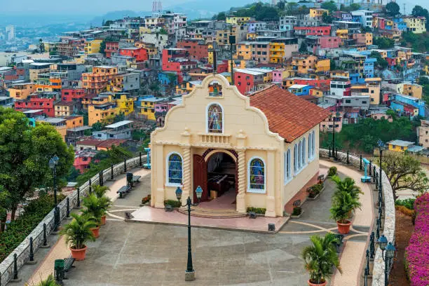 Cityscape of Santa Ana Hill Church with colorful colonial housing, Las Penas district, Guayaquil, Ecuador.