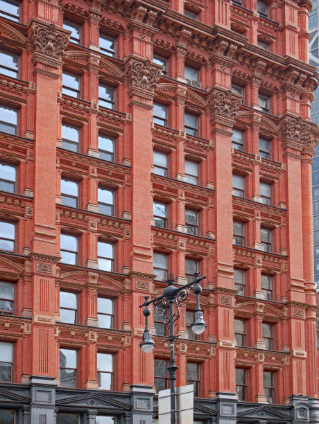 istock Old fashioned New York brick office building with ornate stone decorations 1297527133