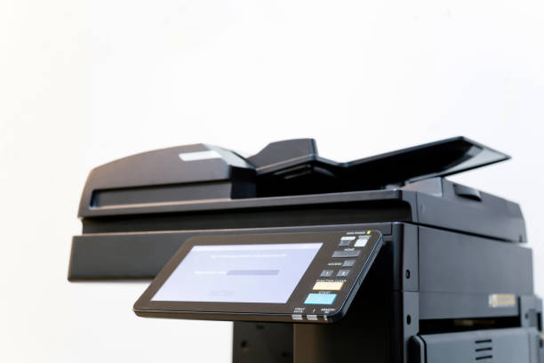 The photocopier or network printer is office worker tool equipment for scanning and copy paper.