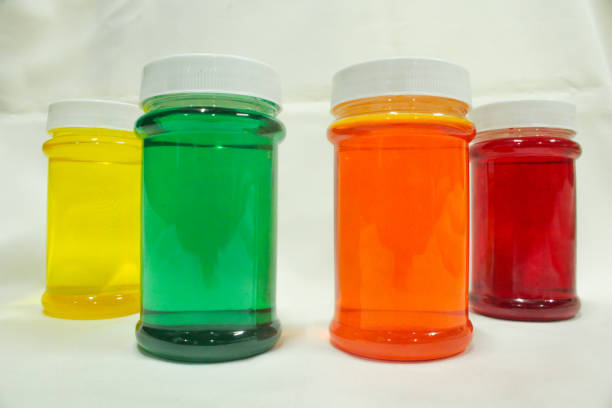 istock Bottles filled with colorful liquids 1297533238