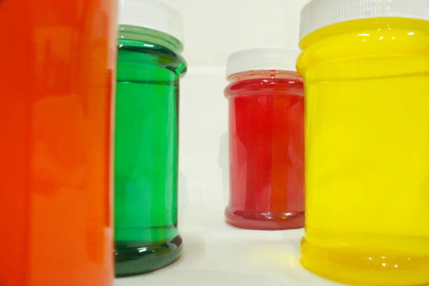 istock Bottles filled with colorful liquids 1297533920