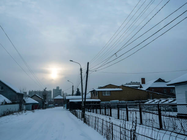 istock suburban landscape in winter during a snowfall 1297539300