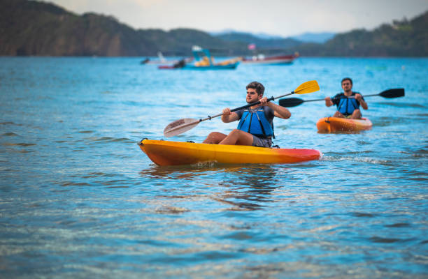 istock Brothers kayaking in Costa Rica 1297541253