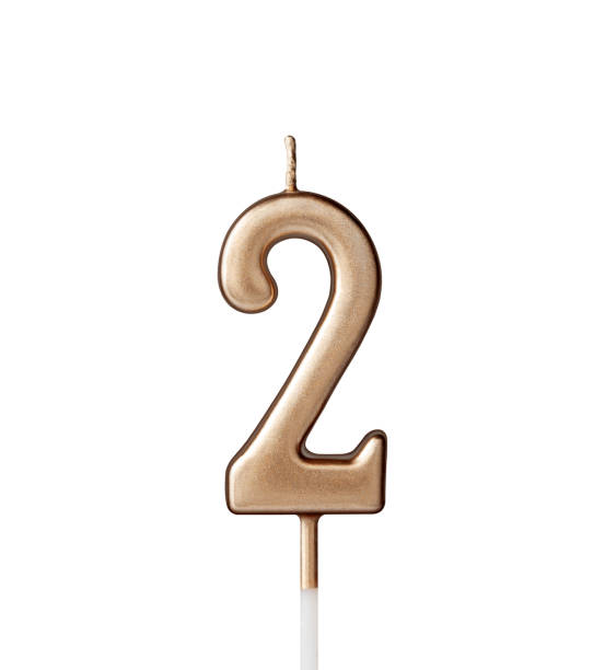 istock Candle in the form of number two 1297541406