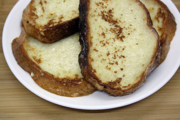 istock Fried white bread in an egg with milk and spices. 1297549783