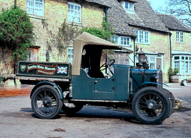 Vintage delivery vehicle outside motor museum, Bourton-on-the-Water, UK.